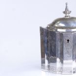 A late Victorian marquise-shaped silver tea caddy, in Georgian style, bright-cut floral engraved