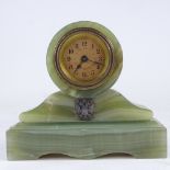 A small Russian green onyx barrel-shaped mantel clock, printed dial with Arabic numerals and applied