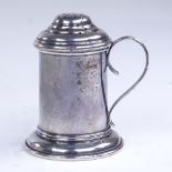 An 18th century provincial silver kitchen pepper, circa 1780, plain cylindrical form with reeded