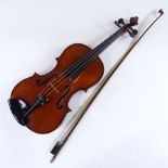 A silver-mounted violin bow, by Adam Heinrich, together with an unnamed early 20th century violin,