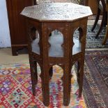 A Persian octagonal chip carved occasional table, W48cm, H69cm