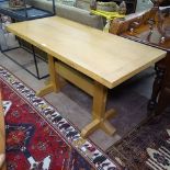 A contemporary Arts and Crafts style oak refectory dining table, L130cm, H74cm, D60cm