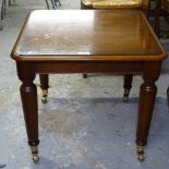 A mahogany lamp table on turned legs, by Charles Barr