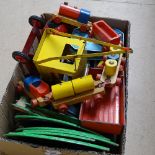 A toy crane, wooden train, track etc