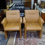 A pair of Poltrona Frau Forum small armchairs in tan leather