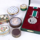 Various collectables, including trinket boxes and a Women's Voluntary Service medal