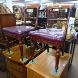 A pair of Victorian mahogany and burgundy leather-seated side chairs