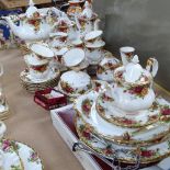 Extensive Royal Albert Old Country Roses bone china tea set, including tiered cake stand, cups and