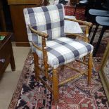 An Antique oak and upholstered Sussex design chair