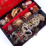 A cantilever jewel box and a quantity of costume jewellery, to include cameo brooches, stone set
