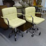 A pair of modern chrome-effect desk chairs, on 5 splayed wheel base