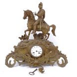A large 19th century brass figural 8-day mantel clock, surmounted by a knight on horseback, case