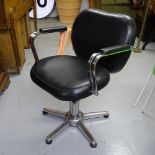 A Vintage chrome-framed adjustable barber's chair, on 5 flat foot