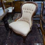 A Victorian mahogany-framed and button-back upholstered nursing chair