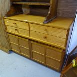A Nathan mid-century teak cabinet with fitted drawers and cupboards, W102cm