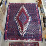 A Kilim red and blue ground floral pattern rug