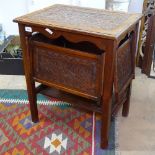 An oak side table with 4 carved pull-down leaves, W53cm, H63cm