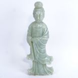 A large Chinese carved and polished jadeite figure, height 36cm