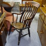 A Victorian elm-seated Windsor kitchen elbow chair