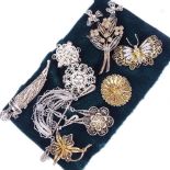 11 various silver and silver-gilt filigree brooches