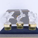 A Lalique Flacons Collection Mascottes glass 3-bottle cologne set, Mascottes include Le Faune,