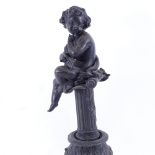 A French 19th century patinated spelter cherub sculpture, on red stepped marble base with gilt-metal