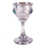 An Israeli sterling silver chalice, with allover chased and embossed decoration, and set with tigers