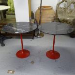 A pair of Eero Saarinen design tulip tables, with black and grey veined marble tops, on painted