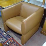 A contemporary design tan leather Club chair