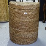A demilune wicker laundry basket, H65cm
