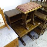 An oak writing desk and matching stool