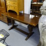 A rectangular oak plank-top refectory table, with carved baluster legs, L167cm