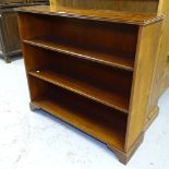 A teak 4-tier open bookcase, W95cm