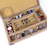 A jewel box containing modern silver stone set rings, pendants and earrings