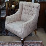 A small Victorian button-back upholstered armchair on cabriole legs
