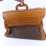 A Louis Vuitton style travel bag, length 60cm
