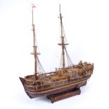 Incomplete handmade model ship on stand, length 55cm, height 61cm
