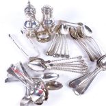 A quantity of silver teaspoons, 2 silver peppers, a napkin ring etc (21oz)