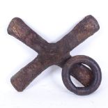 A 19th century Democratic Republic of Congo bronze Katanga cross, and a heavy cast-iron slave