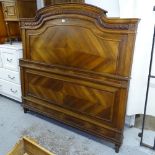 A French carved and panelled walnut 5' bed