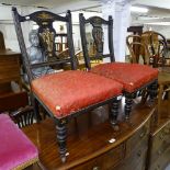 A pair of Victorian black lacquered and gilded nursing chairs, with chinoiserie decoration