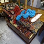 A collection of Antique Persian remnants, cushion covers, saddle bags etc