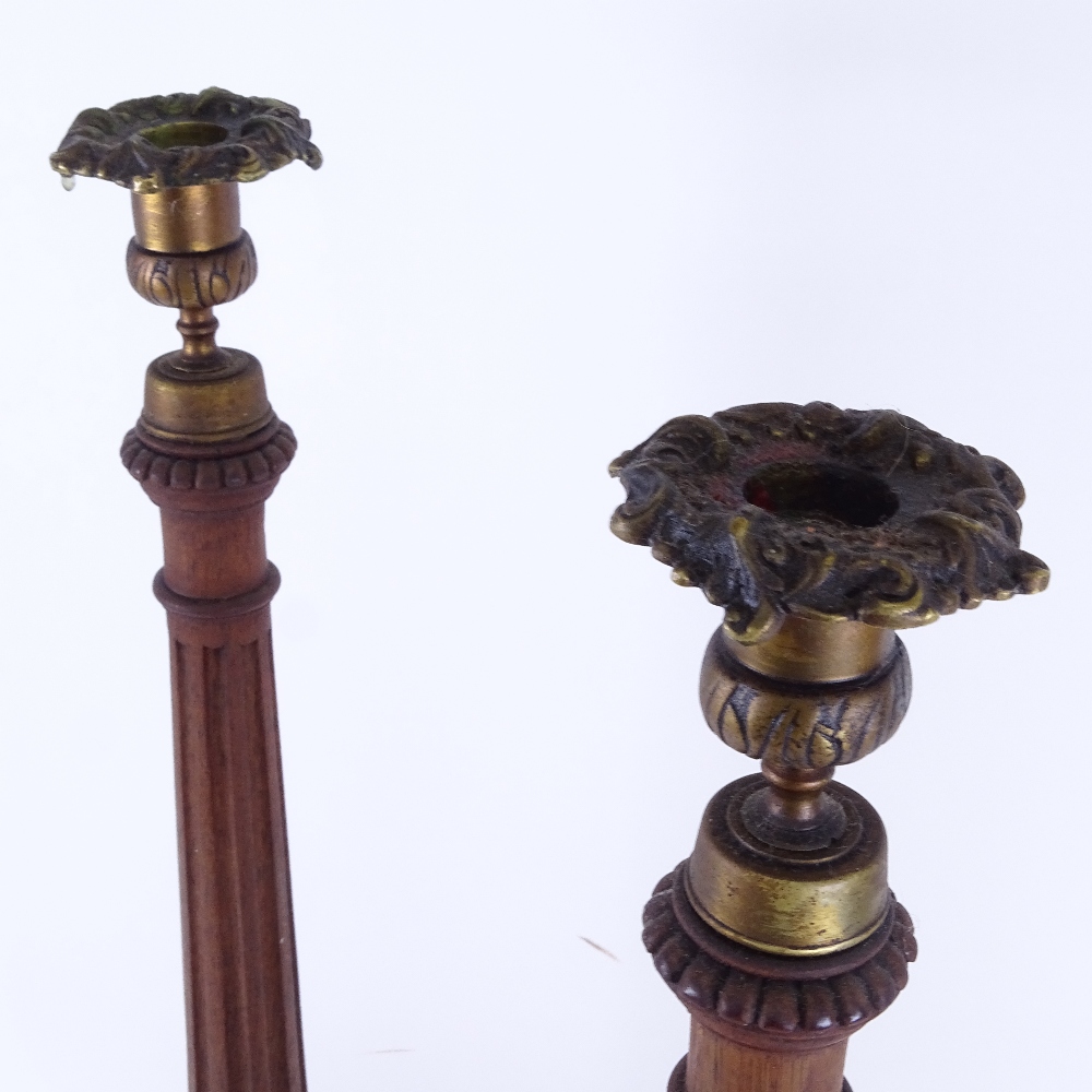 A large pair of carved mahogany table candlesticks with brass mounts, height 57cm - Image 2 of 2