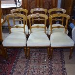 A set of 6 Victorian oak Gothic dining chairs, with upholstered seats and tapered legs