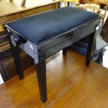 An ebonised rise and fall piano stool