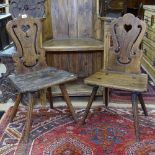 A pair of late 18th/early 19th century Brettstuhl or Tyrolean chairs, with pierced backs