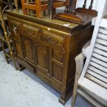 A Chinese design cabinet with fitted drawers and cupboards