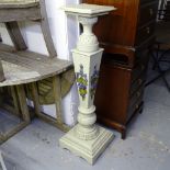 A decorative painted pedestal of fluted form, on stepped plinth base