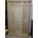 An Antique panelled pine single door wardrobe, W120cm, H180cm