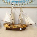 A handmade model of an 18th century pirate ship, on stand, length 72cm, height 58cm